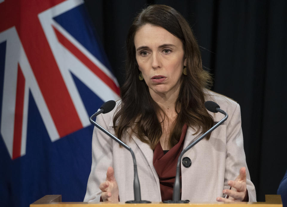 New Zealand Prime Minister Jacinda Ardern speaks during a post-Cabinet press conference on the 1970's dawn raids at Parliament in Wellington, New Zealand, Monday, June 14, 2021. New Zealand's government is formally apologizing for an immigration crackdown nearly 50 years ago in which Pacific people were targeted for deportation, often after early-morning home raids. (Mark Mitchell/NZ Herald via AP)