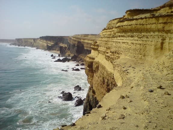 2) Stunning sea cliffs on the coast of Angola were fossil beds reveal a rich Cretaceous ecosystem