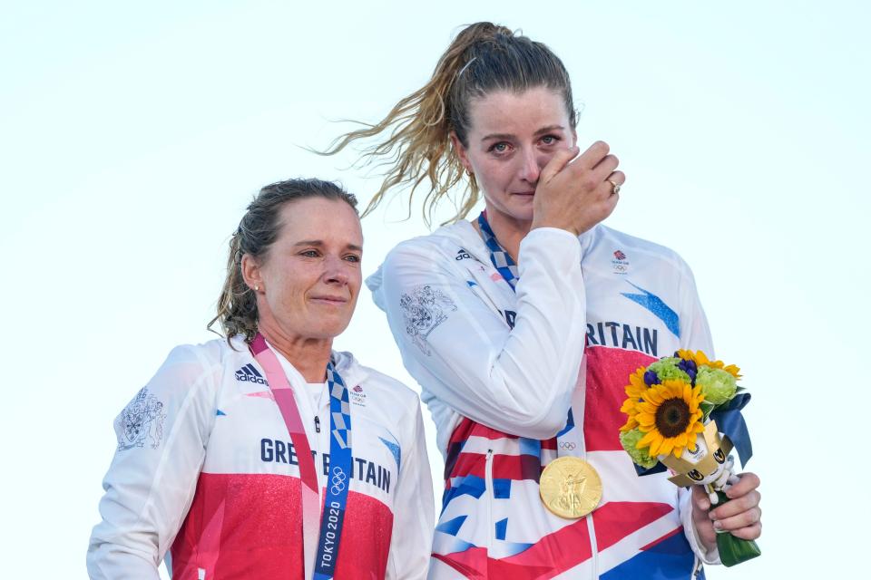 Mills and Mcintyre on the podium (Gregorio Borgia/AP)