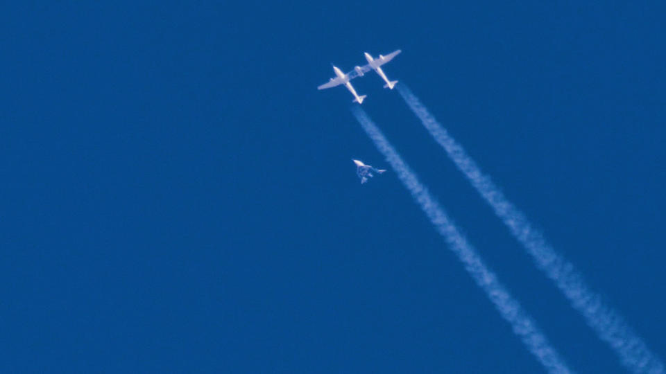 In this Jan. 11, 2018 photo provided by Virgin Galactic, the VSS Unity is released from the WhiteKnightTwo aircraft during a gliding test for SpaceShipTwo near Mojave, Calif. The spaceship isn’t launched from the ground but is carried beneath the special aircraft to an altitude around 50,000 feet (15,240 meters). There, it’s released before igniting its rocket engine and climbing. (Virgin Galactic via AP)