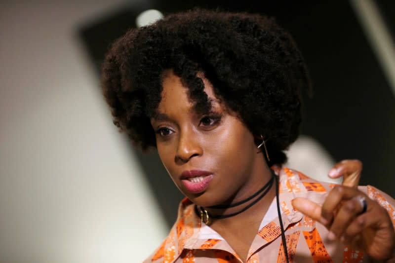 Nigerian writer Chimamanda Ngozi Adichie speaks during an interview with Reuters in Santiago