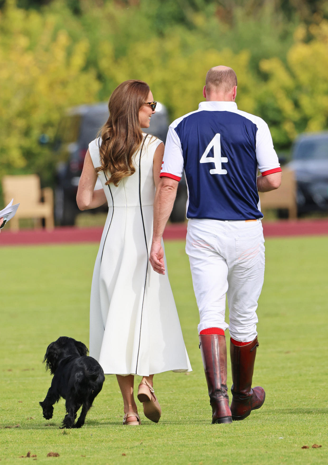 The couple and their pup at the the Royal Charity Polo Cup on July 6, 2022 in Egham, England. (David M. Benett / Dave Benett/Getty Images for Audi UK)