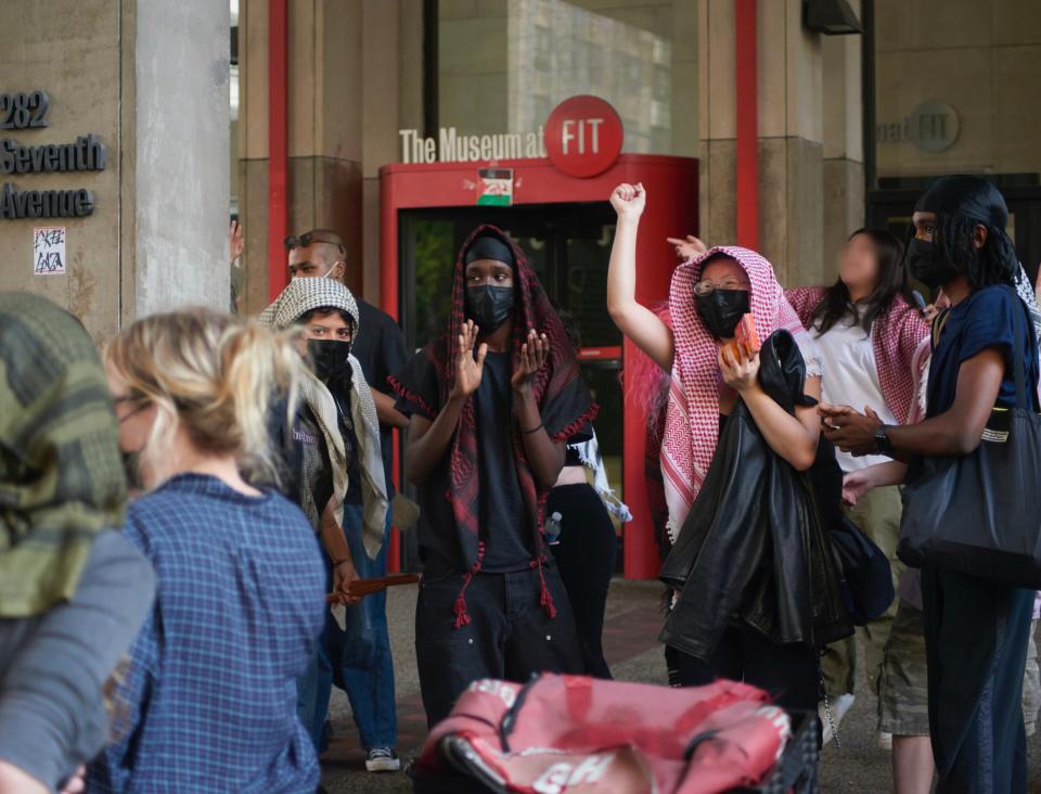 FIT student organizers outside the campus museum