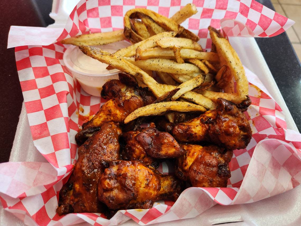 An order of original wings and fries from Wing Man at 711 Main St. in Lexington. Photo by Chris Trainor