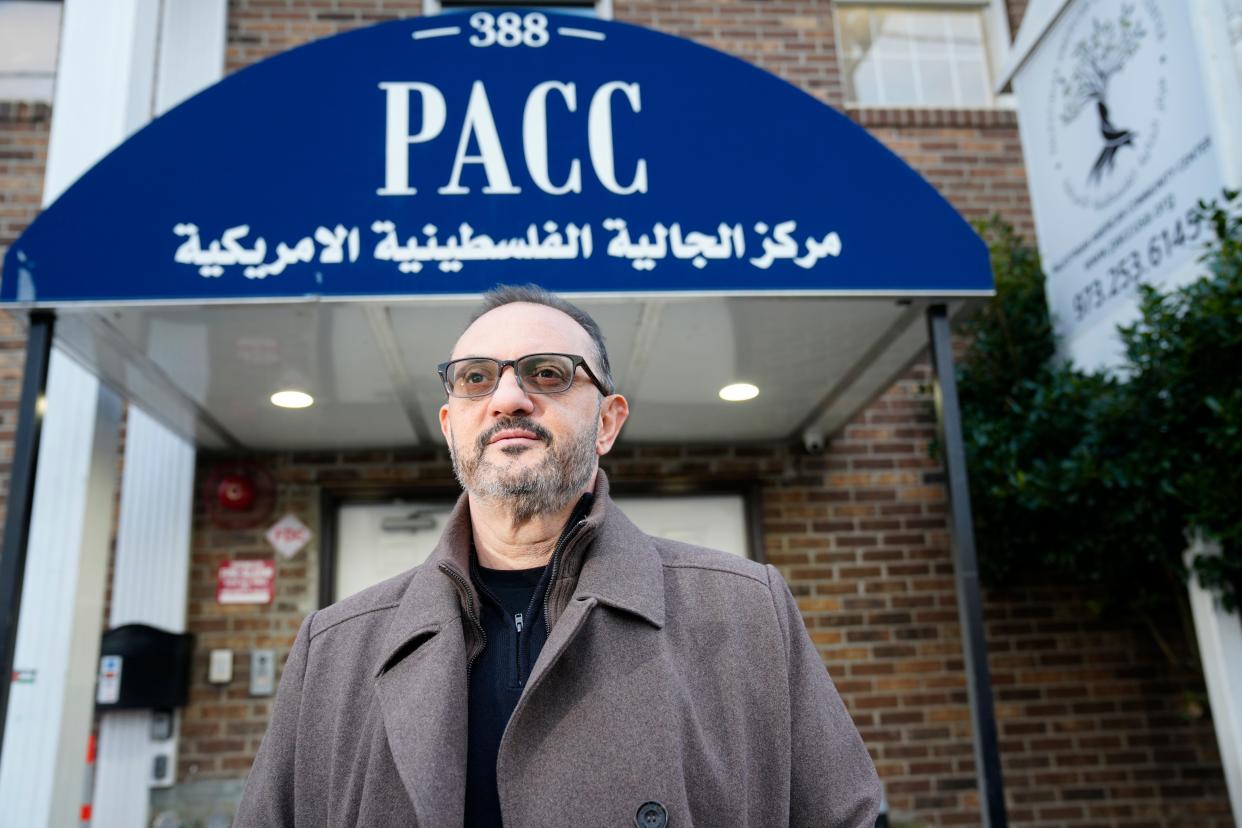 Samer Khalaf, of Paramus, can trace his roots back to Palestine more than a 1,000 years. He says Christmas celebrations will be scaled back this year due to the bloodshed in the Middle East. He is shown here as he poses in front of the Palestinian American Community Center, in Clifton, Tuesday, December 19, 2023.