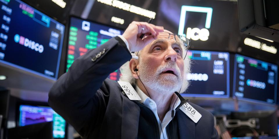 A trader works at the New York Stock Exchange NYSE