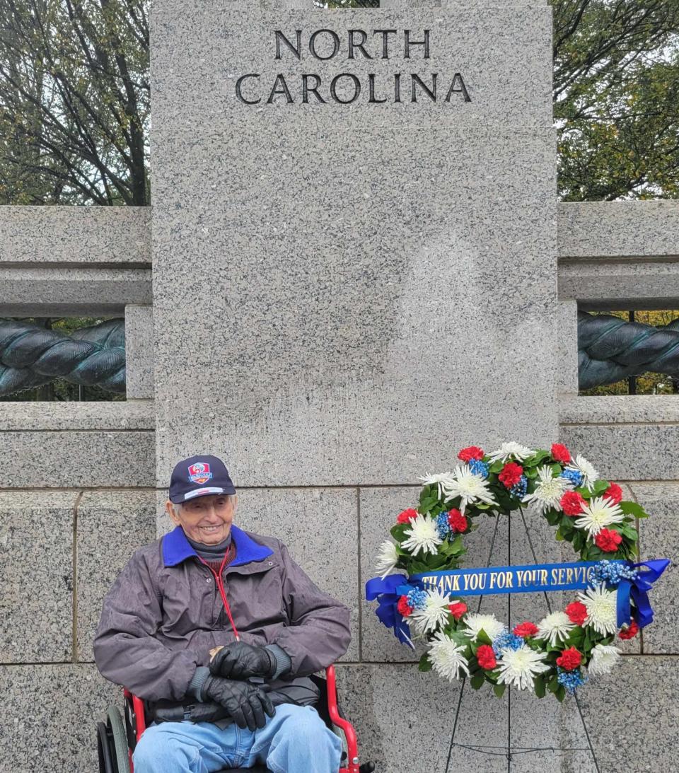 World War II veteran Eugene Jaroslaw of Asheville poses at the North Carolina wall of the World War II Memorial on Oct. 14 in Washington, D.C.