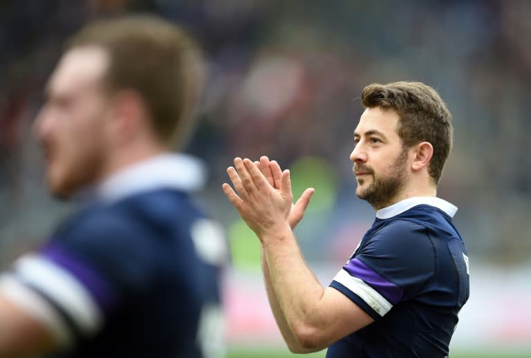 Greig Laidlaw celebrates after his last gasp penalty earned Scotland a 29-27 win over Italy at the Stadio Olympico in Rome