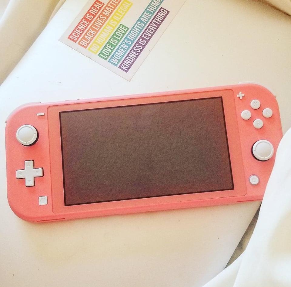 Nintendo Switch Lite in Coral. Image via Sarah Rohoman