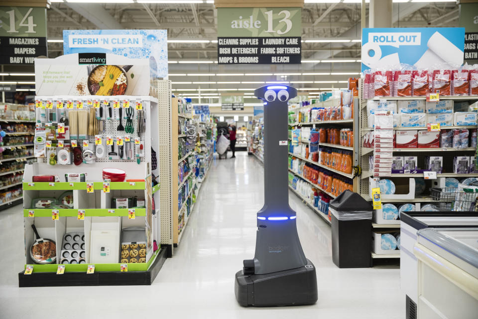 A robot named Marty cleans the floors at a Giant grocery store in Harrisburg, Pa., Tuesday, Jan. 15, 2019. On Monday, the Carlisle-based Giant Food Stores announced new robotic assistants will be arriving at all 172 Giant stores by the middle of this year. The chain's parent company says it plans to eventually deploy the robots to nearly 500 stores. (AP Photo/Matt Rourke)