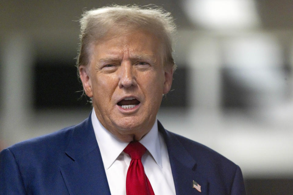 Former President Donald Trump talks to reporters as leaves the courtroom following the day's proceedings in his trial at Manhattan criminal court in New York, Tuesday, April 30, 2024. (Justin Lane/Pool Photo via AP)