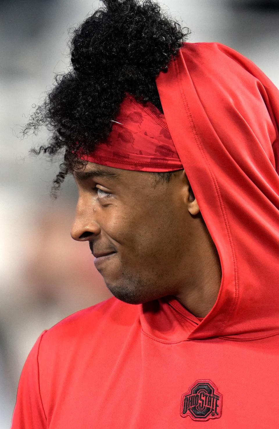 Ohio State linebacker Steele Chambers smiles at a teammate during warmups before a game against Michigan State on Nov. 11.