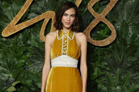 One bidder will get a bespoke dress designed and worn by Alexa Chung (AFP/Getty)