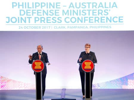 Australian Senator and Defence Minister Marise Ann Payne answers questions from the media with Philippine Defence Secretary Delfin Lorenzana (L) on the sidelines of the Association of Southeast Asian Nations (ASEAN) Defense Ministers' meeting at Clark Field, Angeles City in Pampanga province, north of Manila, Philippines October 24, 2017. REUTERS/Dondi Tawatao