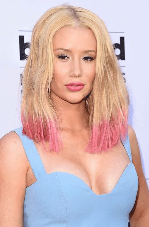 The rapper rocked her tickled pink tips and candy lips at the 2015 Billboard Music Awards in Las Vegas. Her neutral and matte make up tones and kohl-lined eyes with a shimmery shadow made for a unique look against that sky blue dress.