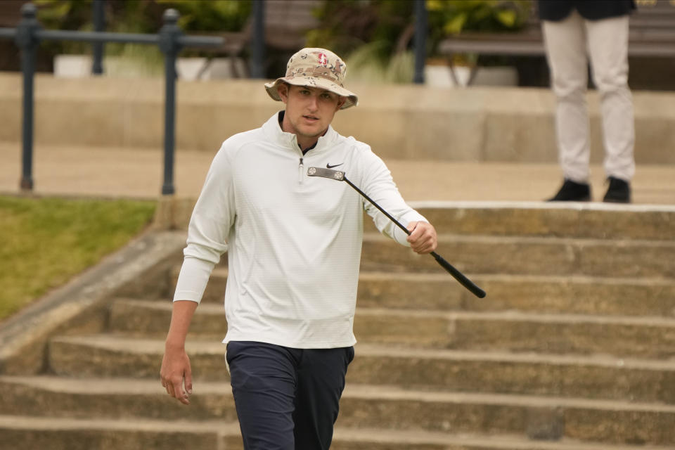 England's Barclay Brown reacts after missing a putt on the 18th green during the first round of the British Open golf championship on the Old Course at St. Andrews, Scotland, Thursday, July 14 2022. The Open Championship returns to the home of golf on July 14-17, 2022, to celebrate the 150th edition of the sport's oldest championship, which dates to 1860 and was first played at St. Andrews in 1873. (AP Photo/Gerald Herbert)