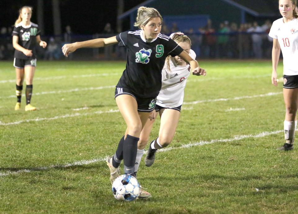 Colchester's Isabel Benoure looks for a teammate to pass to during the Lakers' 1-0 loss to CVU in 2022.