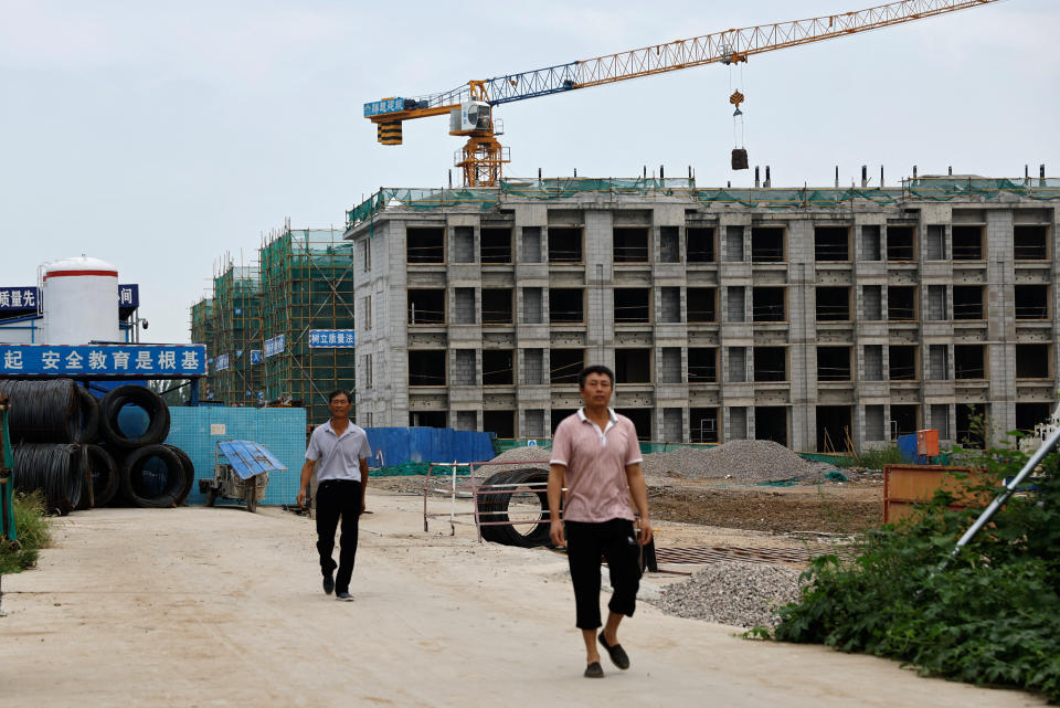 China's property crisis leaves Country Garden with unpaid workers, silent  sites | Reuters