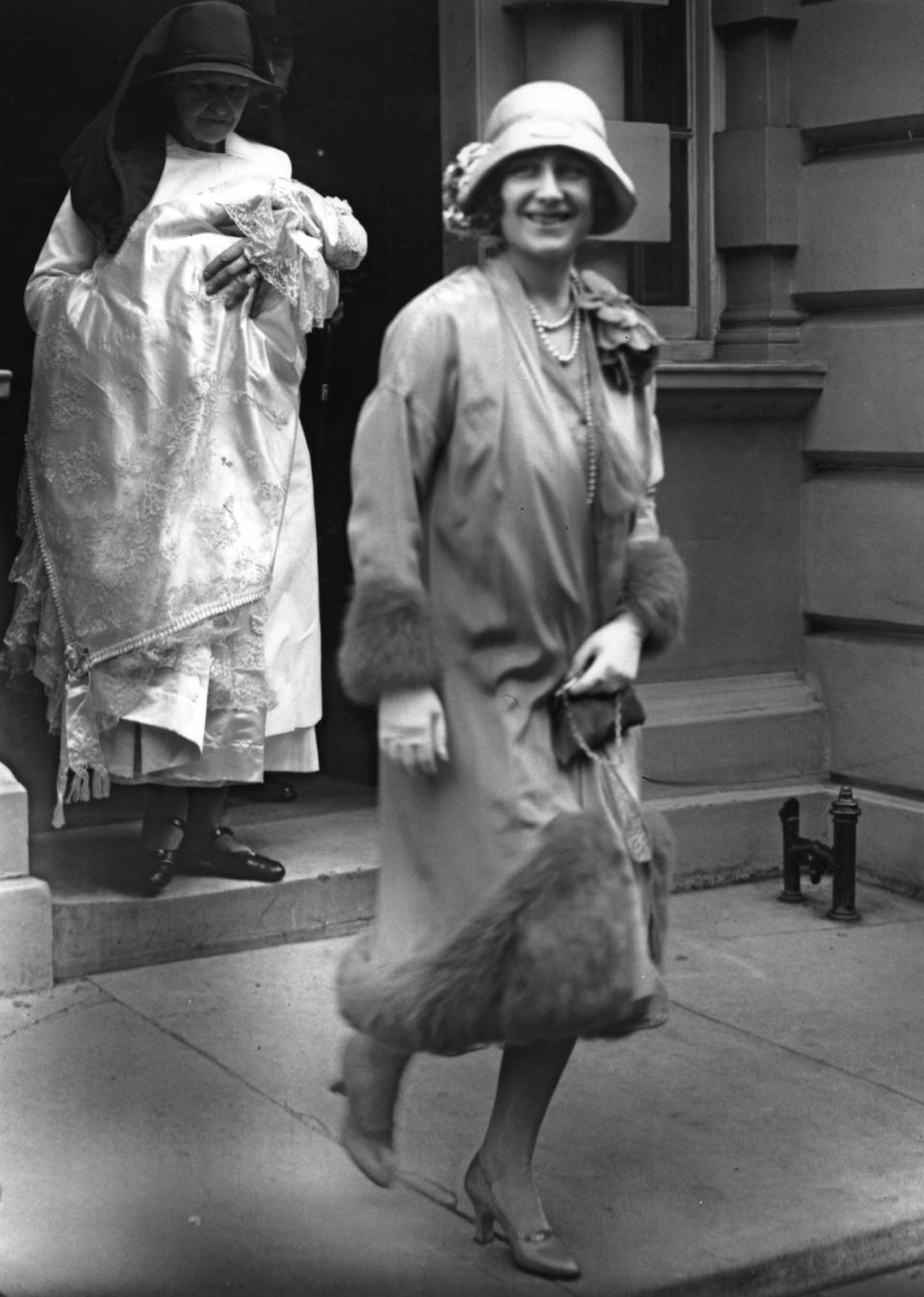 29th May 1926:  The Duchess of York (1900 - 2002) leaving 17 Bruton Street, on her way to the christening of her daughter Princess Elizabeth.  (Photo by E. Bacon/Topical Press Agency/Getty Images)