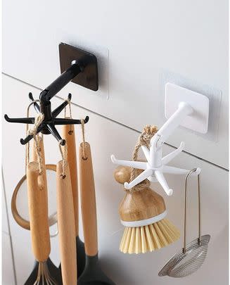 I can't believe I'm only finding out about these self-adhesive utensil holders now. They'll keep your countertops and cutlery drawers clutter-free!