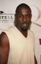 <p>Idris Elba began acting in the '90s and sported a simple haircut with a goatee at the time—which is still his go-to look today. </p>