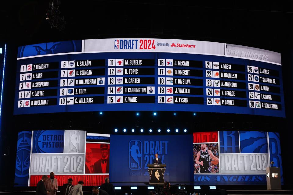 NBA commissioner Adam Silver speaks at the podium after the first round of the 2024 NBA draft at Barclays Center.