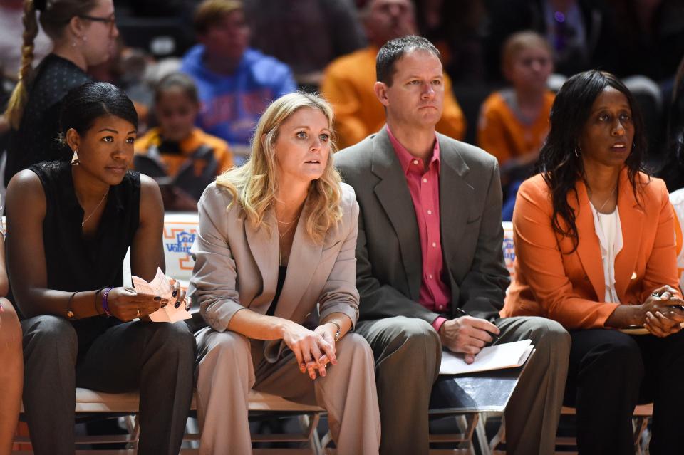 Tennessee Women's Basketball Coach Kellie Harper with assistant coaches, from left, Joy McCorvey, Jon Harper, and Samantha Williams during the NCAA women's basketball game between the Tennessee Lady Vols and Georgia Stage Panthers in Knoxville, Tenn. on Sunday, December 12, 2021. 