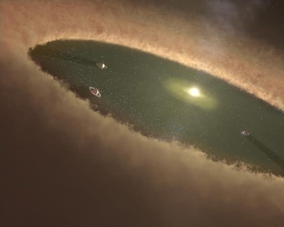 Artist's illustration of planets forming in a circumstellar disk like the one surrounding the star LkCa 15. The planets within the disk's gap sweep up material that would have otherwise fallen onto the star.