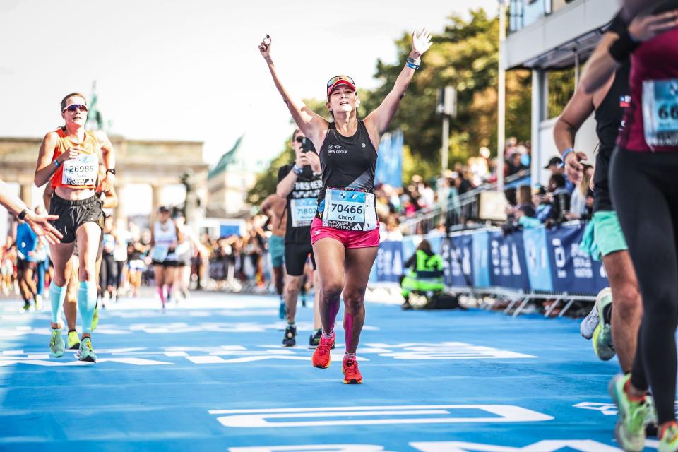 Writer Cheryl Tay crossing the finish line at the 2023 Berlin Marathon. (PHOTO: Cheryl Tay)