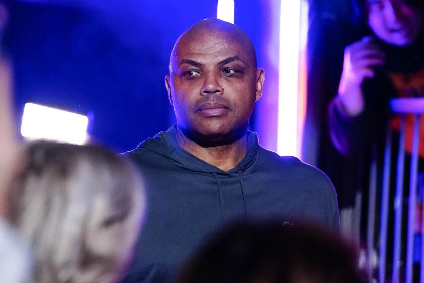 NBA Hall of Famer and former Phoenix Suns star Charles Barkley is introduced during halftime