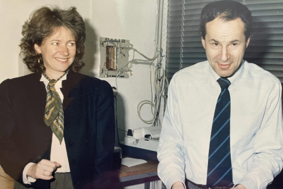 In this undated family handout, Roland Prinz shares a laugh with former Vienna bureau chief Alison Smale in Vienna. Prinz, who was born as armies began marching across central Europe then spent nearly four decades covering the Cold War and the fall of communism for The Associated Press, has died it was announced Friday, Dec 1, 2023. He was 85. (Family Handout via AP)