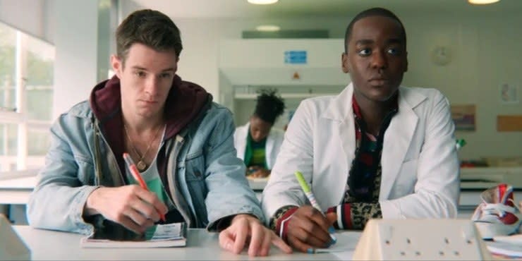 "Sex Education" characters Adam and Eric subtly flirting in their shared science class