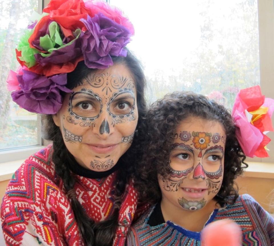 Alma Paz-San Miguel with her daughter, Sofia San Miguel during a Day of the Dead celebration.