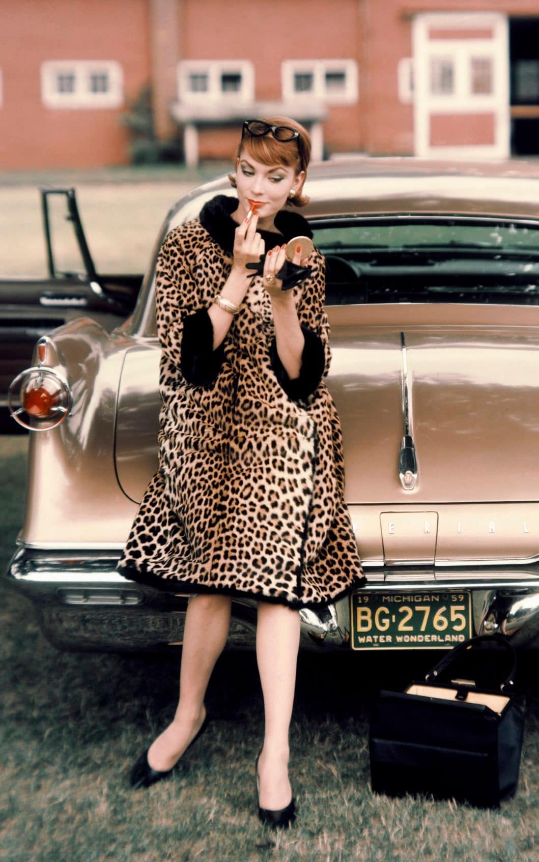 A model wears leopard print in Vogue, 1959 - Conde Nast Collection Editorial