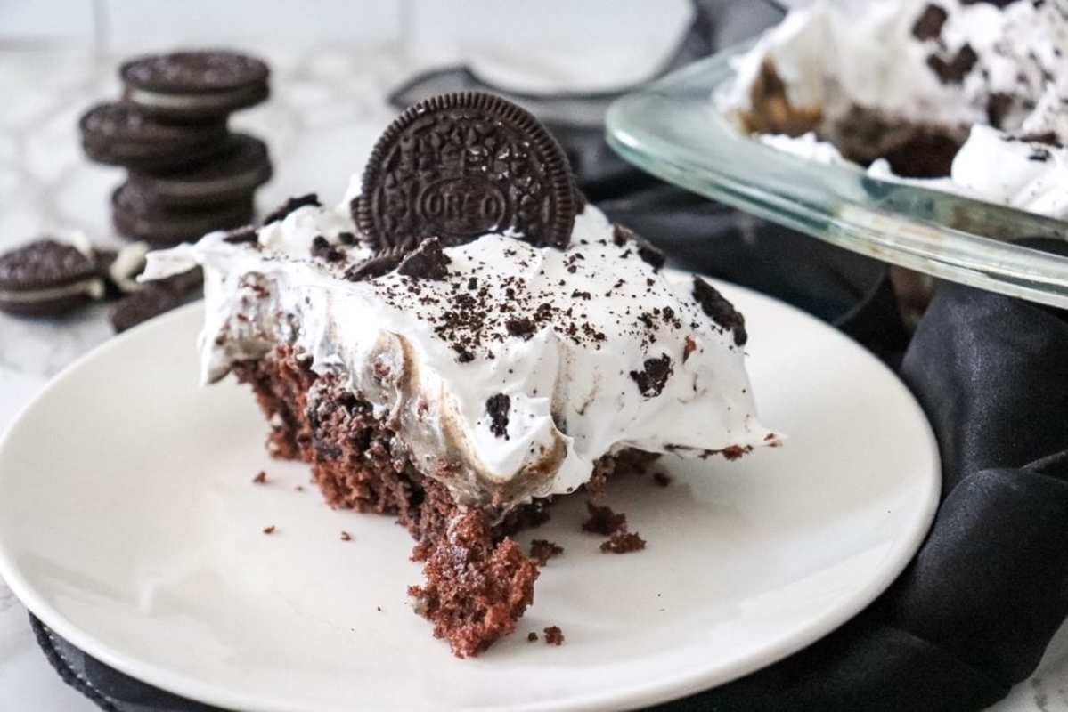 <p>Razzle Dazzle Life</p><p>This Cookies and Cream Chocolate Poke Cake is the perfect dessert for any occasion. It is so easy to make, and will be devoured in a moment of minutes. It is that good!</p><p><strong>Get the recipe: <a href="https://www.razzledazzlelife.com/cookies-and-cream-chocolate-poke-cake/" rel="nofollow noopener" target="_blank" data-ylk="slk:Cookies and Cream Chocolate Poke Cake;elm:context_link;itc:0;sec:content-canvas" class="link rapid-noclick-resp">Cookies and Cream Chocolate Poke Cake</a></strong></p>