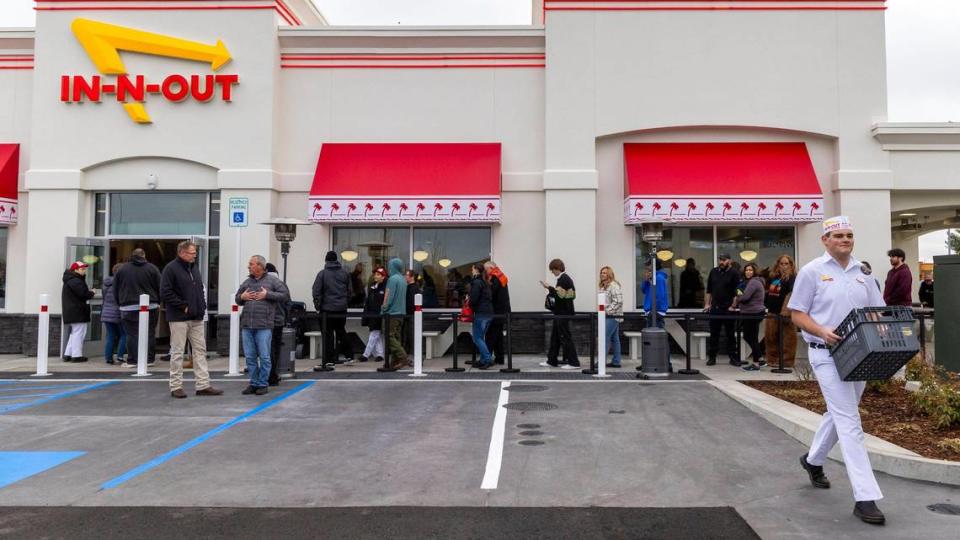 California-based fast food giant In-N-Out opens in Meridian with people waiting in line for hours at The Village, Tuesday, Dec. 12, 2023. Some fans camped overnight in the parking lot, while others arrived at the break of dawn for the chance to order a Double-Double “animal style.”