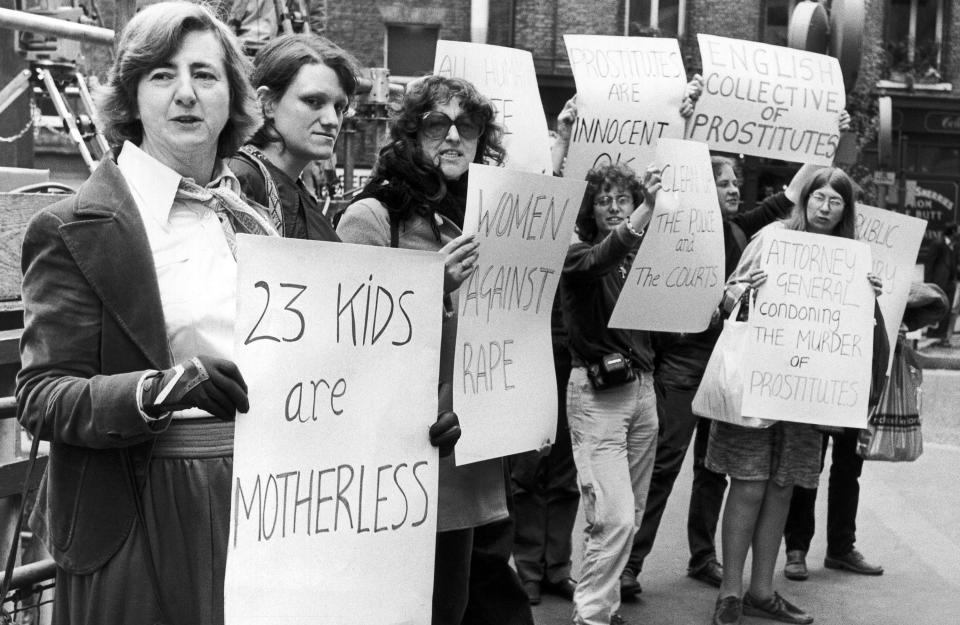 Demonstrators near the Old Bailey when the trial of Peter Sutcliffe continued in London, Friday, May 8, 1981. (AP Photo)