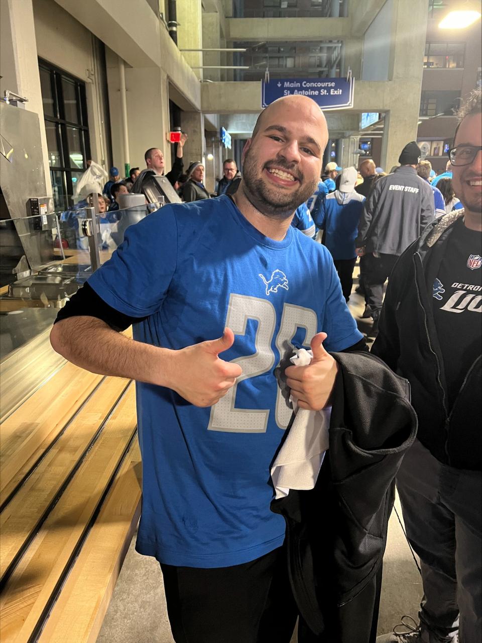 Nick Haddad, of Livonia, is all smiles after the Detroit Lions defeated the Tampa Bay Buccaneers on Sunday, Jan. 21, 2024. Haddad said the victory "makes me feel like I'm top of the world."w