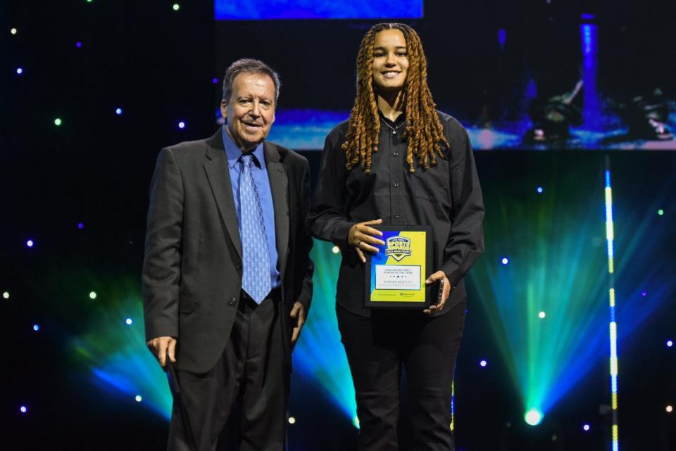 Palm Beach Post Sports Editor Nick Pugliese poses for a picture with the 2022 Girls Basketball Player of the Year, Kendra Bentley of Santaluces High School, during the Palm Beach Post High School Sports Awards ceremony at the Kravis Center in West Palm Beach, FL., on Wednesday, June 1, 2022.