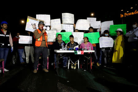 A family member addresses the media during a news conference, near the site of a building collapsed in an earthquake, in Mexico City, Mexico September 25, 2017. REUTERS/Daniel Becerril