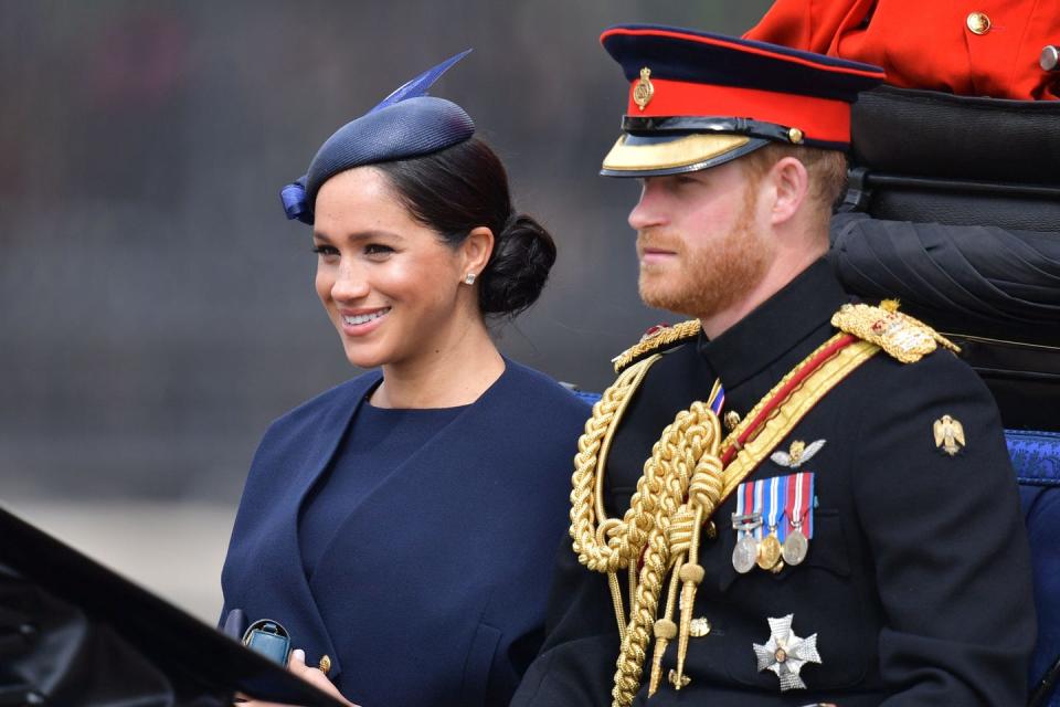 <p>Meghan and Harry arrive at the parade via carriage.</p>