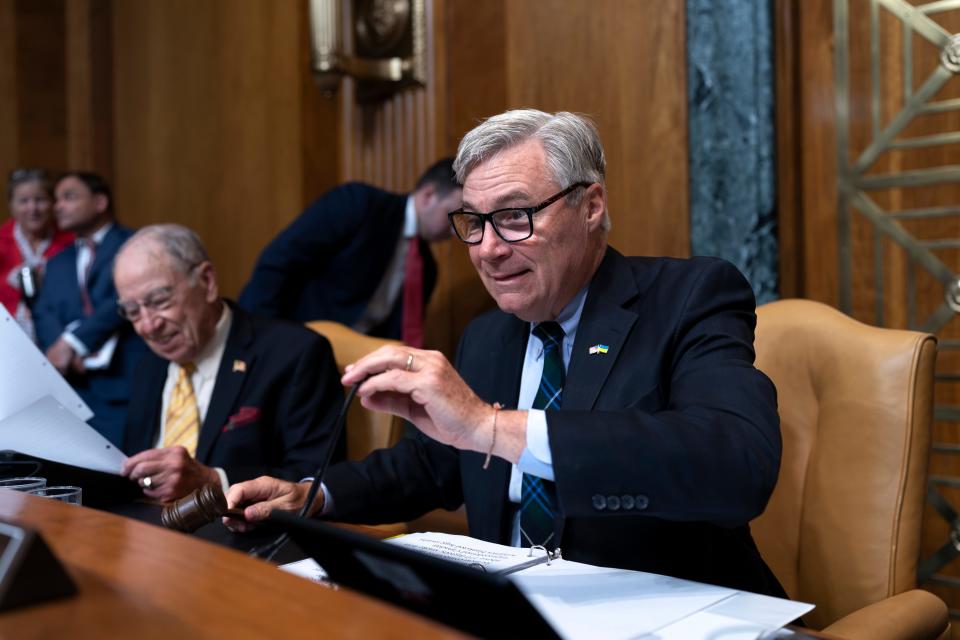 Senate Budget Committee Chairman Sheldon Whitehouse, D-R.I., right, and Ranking Member Chuck Grassley, R-Iowa, left, lead a climate-change hearing in Washington on July 26. Whitehouse has proposed term limits for Supreme Court justices.