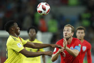 <p>Colombia’s Davinson Sanchez, left, and England’s Harry Kane challenge for the ball during the round of 16 match between Colombia and England at the 2018 soccer World Cup in the Spartak Stadium, in Moscow, Russia, Tuesday, July 3, 2018. (AP Photo/Alastair Grant) </p>