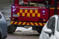 <p>The shrouded body of a stabbing victim on the Turku Market Square on Aug. 18, 2017, after several people were stabbed. (Roni Lehti/Lehtikuva via AP) </p>