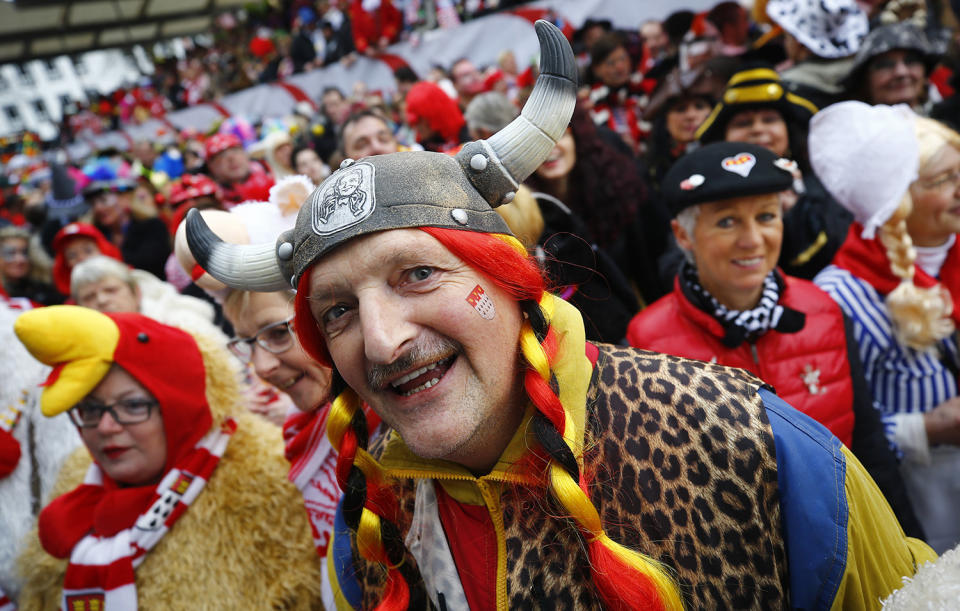 <p>Carnival revellers celebrate during “Weiberfastnacht” (Women’s Carnival) in Cologne, Germany on Feb. 23, 2017, marking the start of a week of street festivals with the highlight “Rosenmontag”, Rose Monday processions. (Photo: Wolfgang Rattay/Reuters) </p>