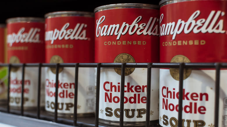 A shelf of Campbell's soups