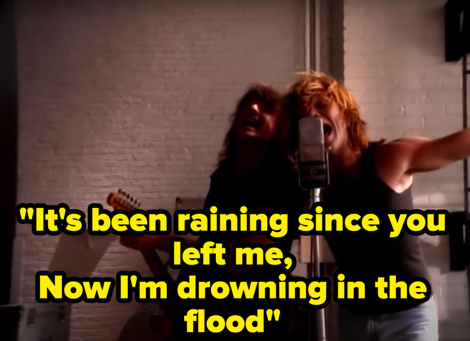 Still from the music video with the lyric: ""It's been raining since you left me, Now I'm drowning in the flood"