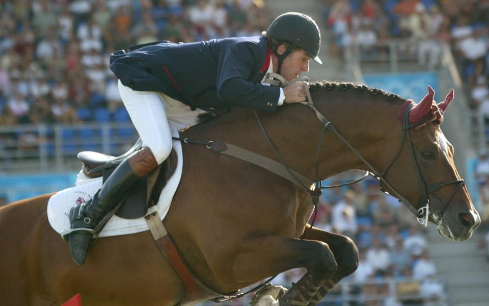Nick Skelton, here in action with Arko III at the 2004 Olympic Games in Athens, won gold at London 2012 and Rio 2016 - EPA/Jens Wolf