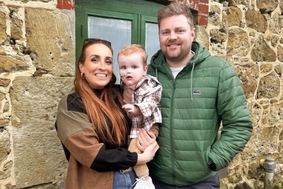 Isle of Wight County Press: Toddler, Teddy Ward, with parents Jess and Dan.