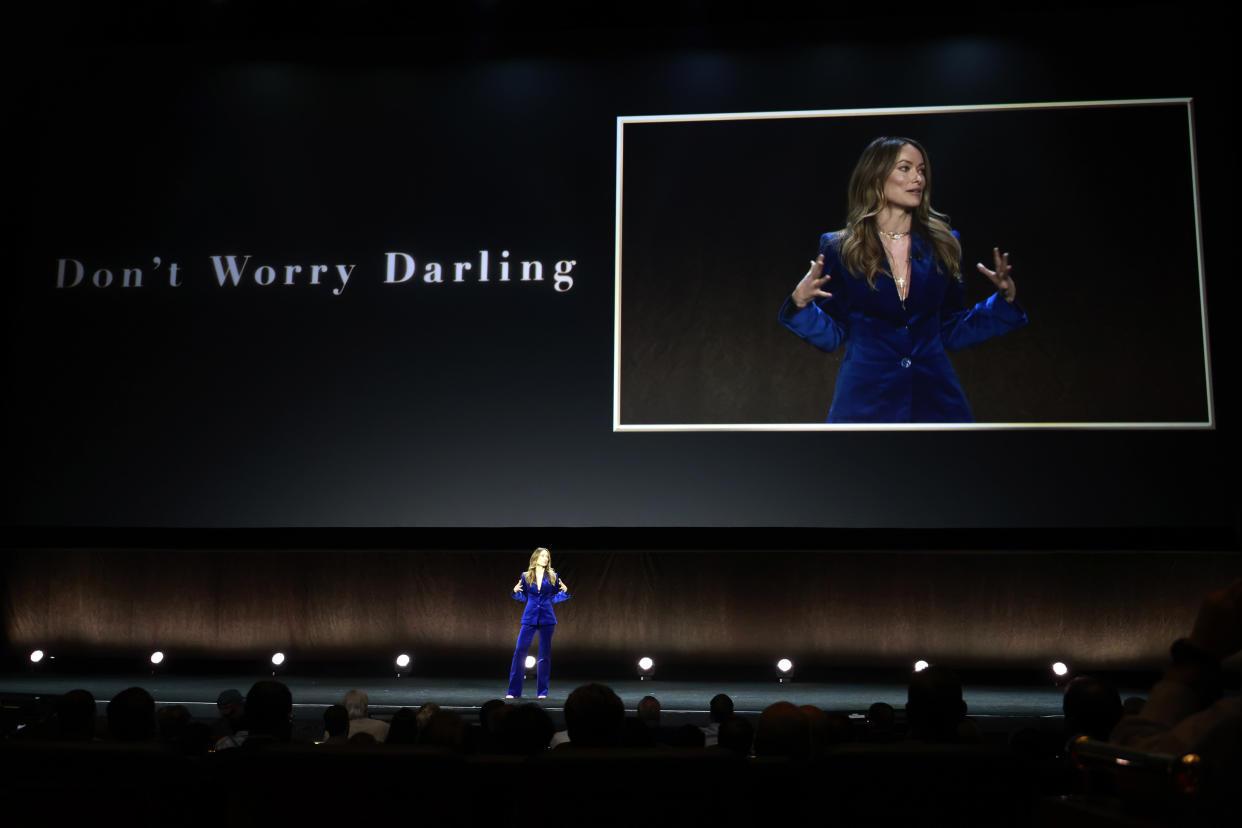 LAS VEGAS, NEVADA - APRIL 26: Olivia Wilde speaks onstage during CinemaCon 2022 - Warner Bros. Pictures “The Big Picture” Presentation at The Colosseum at Caesars Palace during CinemaCon, the official convention of the National Association of Theatre Owners, on April 26, 2022 in Las Vegas, Nevada. (Photo by Frazer Harrison/Getty Images for for CinemaCon)